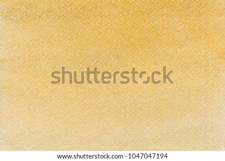 Colorful gold with yellow chalk pastel texture on white paper background. Abstract pencil strokes.