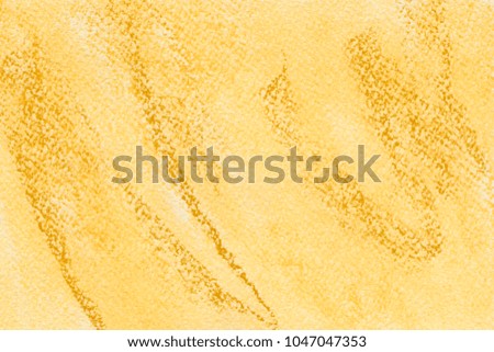 Colorful gold with yellow chalk pastel texture on white paper background. Abstract pencil strokes.