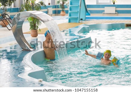 GRODNO, Belarus - Health resort Porechye. Children bathe in a shallow pool