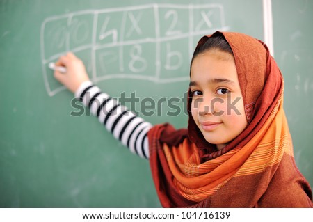 Beautiful arab girl wearing hijab in school