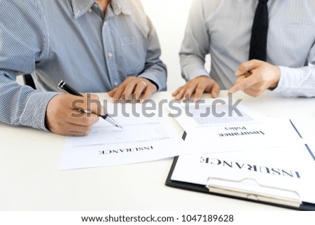 Business man agreement to sign for contract for new home buy or rent