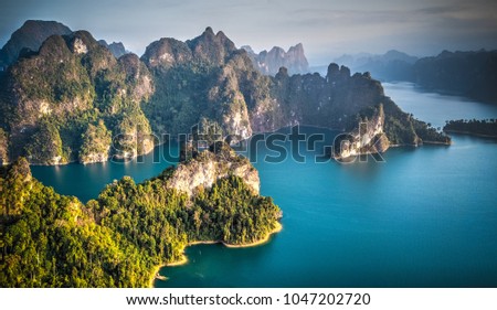Scenic mountains on the lake in Khao Sok National Park Royalty-Free Stock Photo #1047202720
