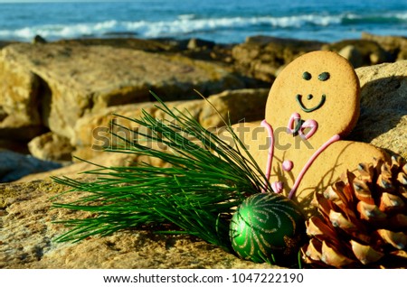 Gingerbreadman Christmas by the sea green pine needles and cone Christmas in July