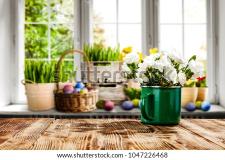 Easter table background with window and free space for your decoration. 