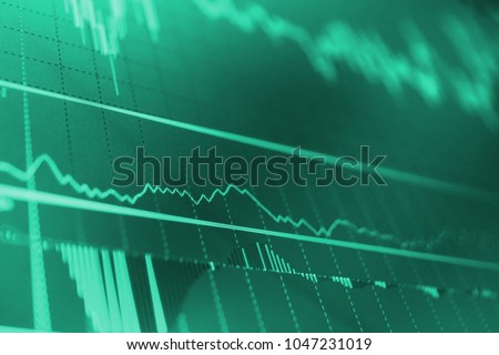 World economics graph.  Analytics U.S. dollar index DXYO.  Selective focus.  Blue background with stock chart. Candle stick graph chart. Growing business graph with rising up trend. 