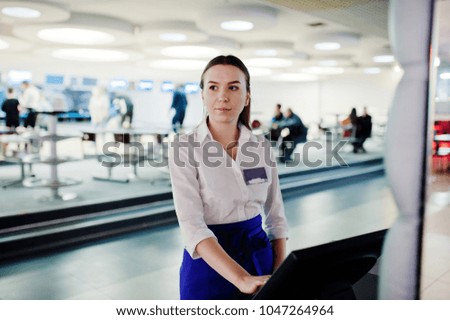 Waiter girl working with pos terminal or cashbox at cafe. People and service concept
