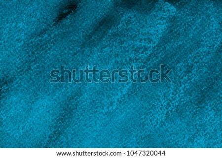 Colorful blue chalk pastel texture on black paper background. Abstract pencil strokes.