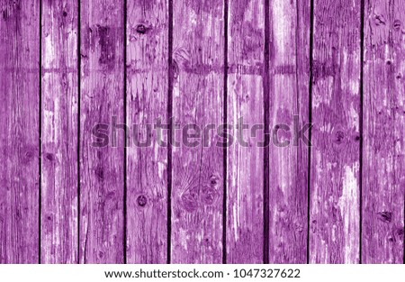 Wooden fence pattern in purple tone. Abstract background and texture for design.