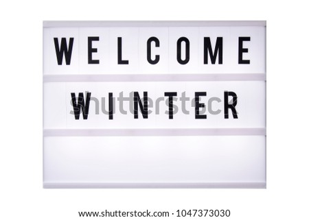 Welcome winter text in a light box. Box isolated over white background. A sign with a message

