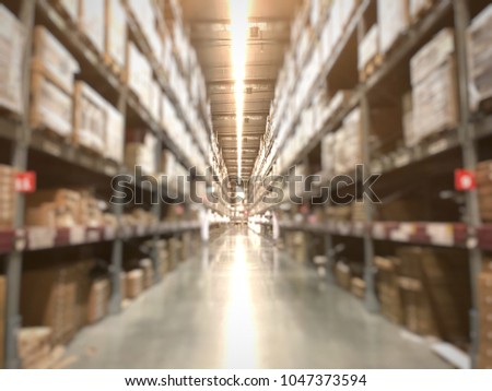 Abstract Blurred photo of warehouse or storehouse industrial and logistic company.Warehousing on the floor and called the high shelves
