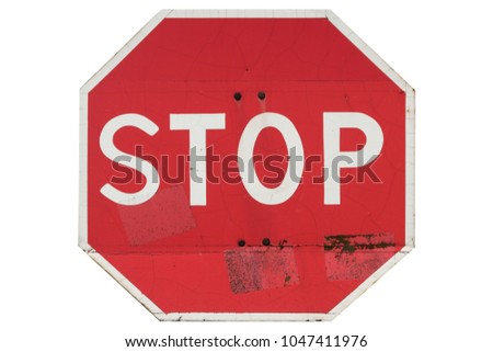 Old red road sign 'Stop and give way' isolated on white.