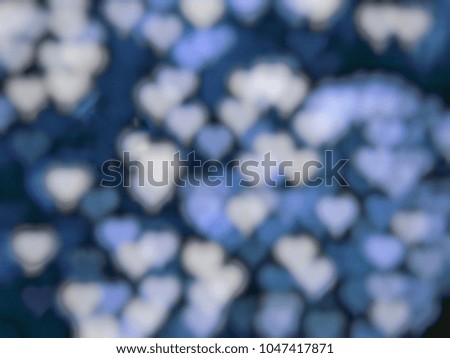 Background of heart bokeh in blue.