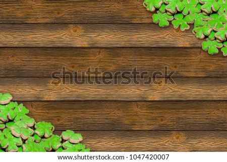 background rustic decor combination eco theme celebration of the day saint patrick spring cheerful holiday decoration wooden surface small biscuits leaves clover design menu