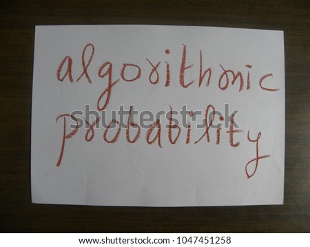 Text algorithmic probability hand written by brown oil pastel on white color paper