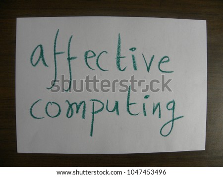 Text affective computing hand written by green oil pastel on white color paper