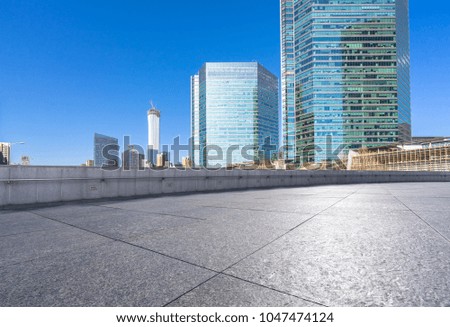 empty floor and square with modern building in beijing china