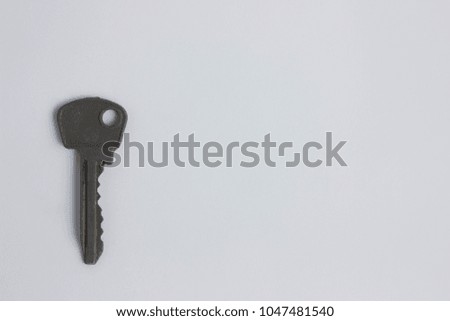 iron key from home on a white background