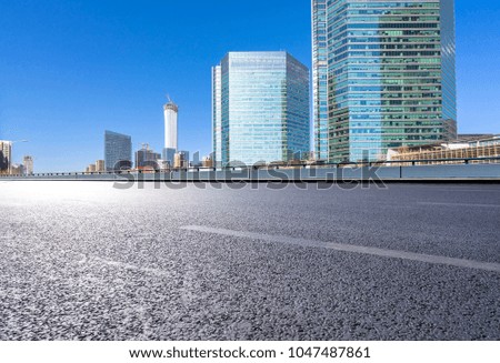 empty road with modern building in beijing china