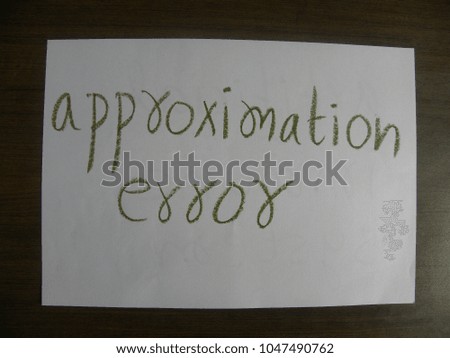 Text approximation error hand written by green oil pastel on white color paper