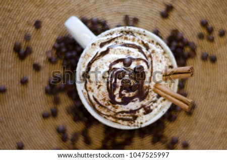 coffee in mug beans neutral background