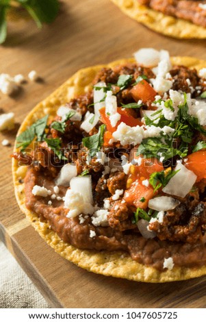 Homemade Beef and Cheese Tostadas with Lime and Cilantro