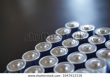 Close-up shot of a group of batteries. Concept of energy, power and recycling. High resolution image.