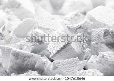 Pieces of white styrofoam close up Royalty-Free Stock Photo #1047618646