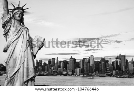 black and white new york city midtown manhattan skyline cityscape over hudson river. statue of liberty photo new york city black and white hi contrast effect usa america. 