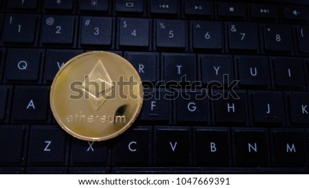 Ethereum cryptocurrency on black keyboard