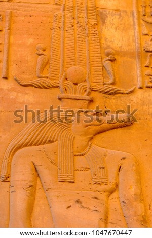 Sobek god, Temple of Kom Ombo, sundown, Egypt. Royalty-Free Stock Photo #1047670447