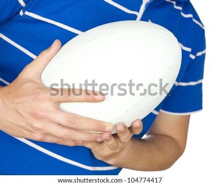 rugby player with ball against white background