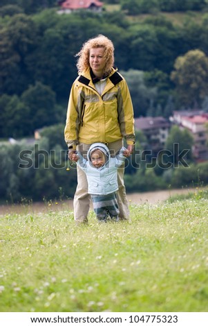 Grandmother and grandson on nature background