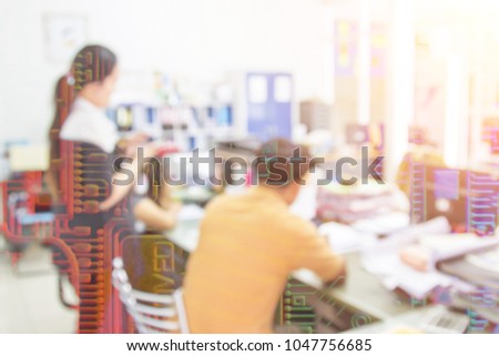 Businessmen blur in the workplace. Blurred office computer people teamwork electronic and technology.