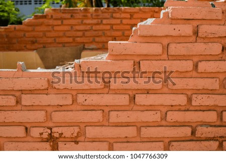 The broken brick wall,old brick wall background.