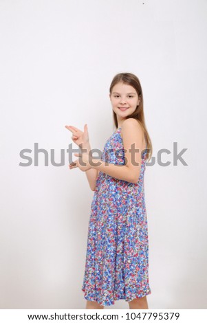 Studio image of lovely emotional caucasian teen girl