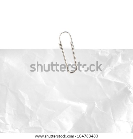 Gray note paper with paper clip on white background.