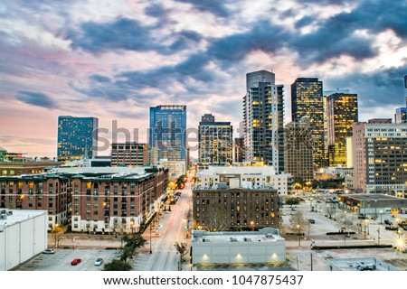 Aerial View of Downtown Houston and Busy Avenue at Dusk - Houston, Texas, USA 