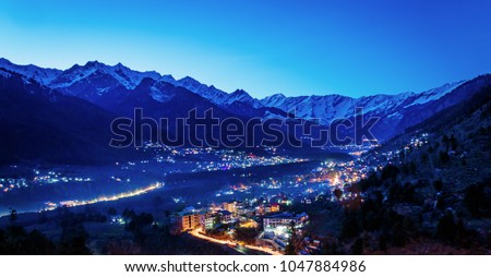 Beautiful View of Himalayas mountains and manali city after sunset in Manali,India Himachal. Long Exposure Royalty-Free Stock Photo #1047884986