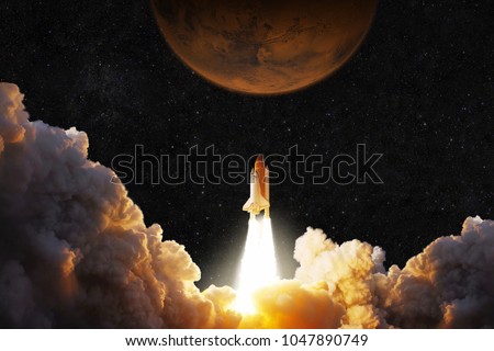 Spacecraft takes off into space. Rocket flies to Mars. Red planet Mars in space Royalty-Free Stock Photo #1047890749