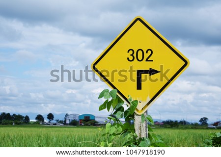 302 redirect code, text of number 302 and arrow traffic signs on yellow board.