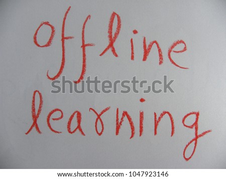 Text offline learning hand written by red oil pastel on white color paper