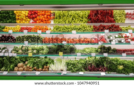 vegetables in supermarket grocery food background  Royalty-Free Stock Photo #1047940951