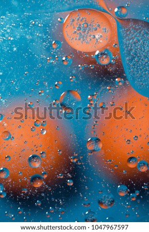 Abstract fullcolor background. Drops and bubbles of liquid. The concept of the Microcosm.
