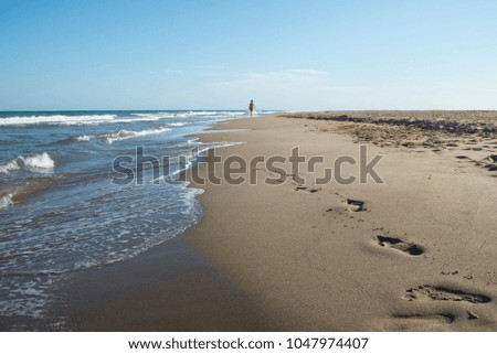 Footprints on the sand beach