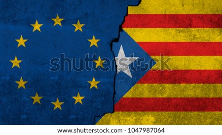 Flags of European Union and Catalonia painted on the wall. 