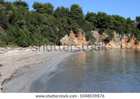 Skala is a sandy surrounded by pine trees beach located between the beaches of Alonaki and Ormos Odyssea near Parga in Preveza, Greece