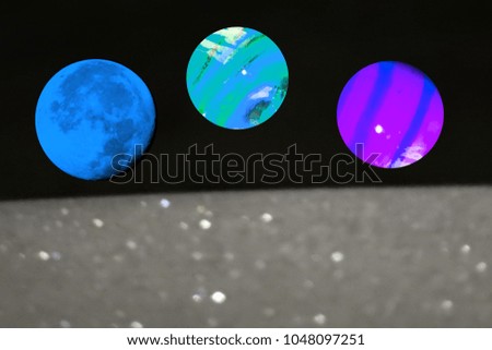 Blue and Violet Planets over the Top of a Car with Hoar Frost, Germany, Europe
