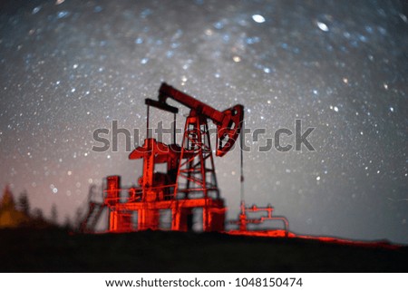 Special tilt-lens of, Ukrainian Carpathians classical technology of oil and gas electric pumps on the background of the eternal beauty of the stars of the universe Galaxy