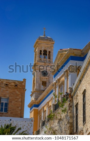 Architectural buildings and narrow paved streets at Vaporia in Ermoupolis town, Syros. Its an old aristocratic district of Syros island. Cyclades, Greece, Europe