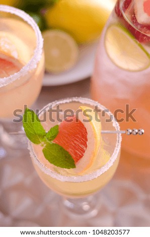 Grapefruit fancy drinks pink on silver table party 